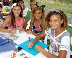 From left, Soleil Gessner, 12, Aysha Clendinen, 13, and Mirisa Clendinen, 13, take part in celebration of reading. From left, Soleil Gessner, 12, Aysha Clendinen, 13, and Mirisa Clendinen, 13, take part in celebration of reading.